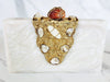 Gold and Stone Embellished White Resin Clutch