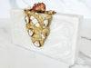 Gold and Stone Embellished White Resin Clutch