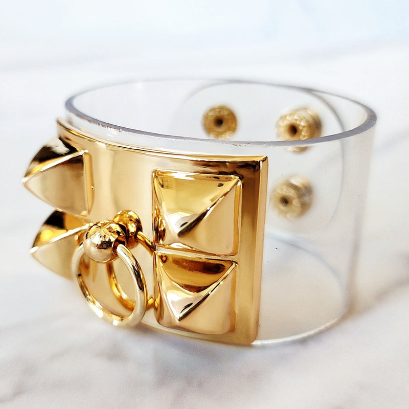 Gold Double Knot Purse, Spike Bangle and Gold Transparent Cuff Bracelet